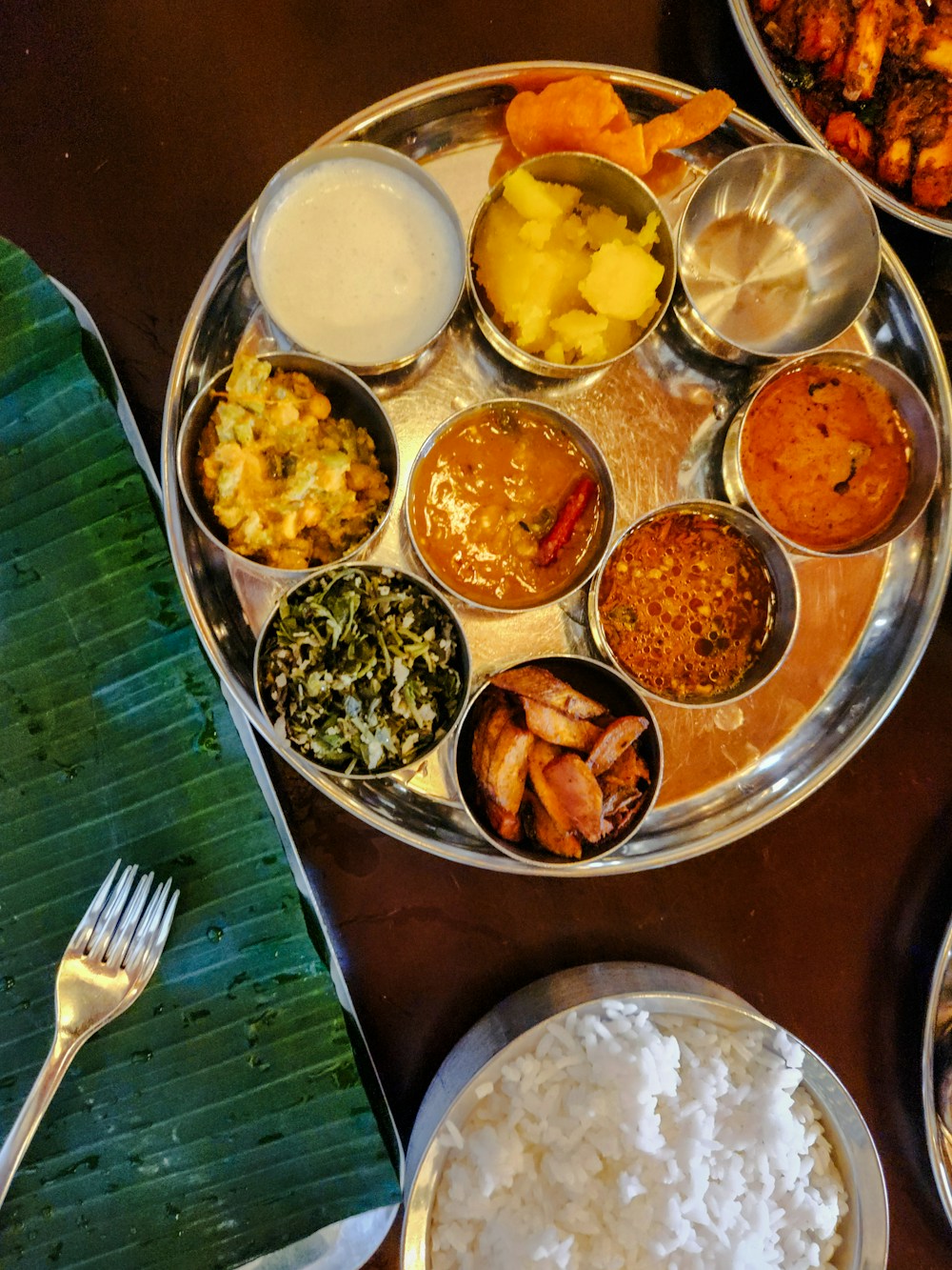 Traditional vegetarian Tamil lunch thali with variety of dishes