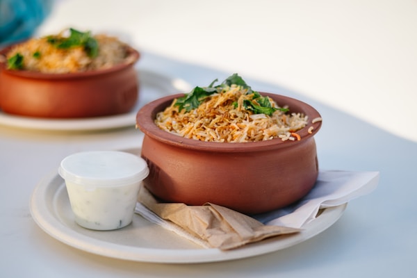 Fragrant vegetable biryani served with raita